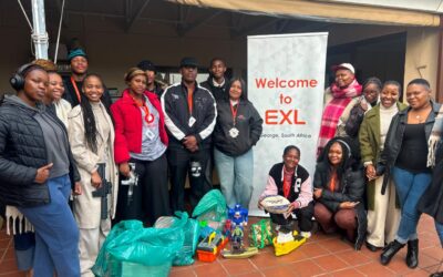 EXL DONATES TOYS